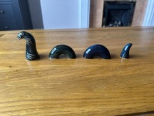 Listing image for Four part Vintage Loch Ness Monster Pottery Figure Kitsch Ornament - Aviemore