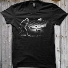 Listing image for Bigfoot Nessie UFO Shirt | Cryptid T-Shirt | Sasquatch Loch Ness Monster Tee |